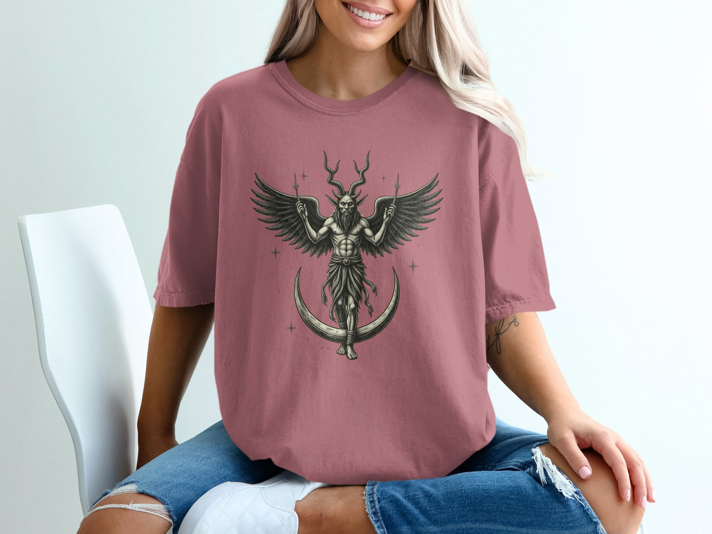 Mysterious Winged Horned Deity Graphic T-shirt Product