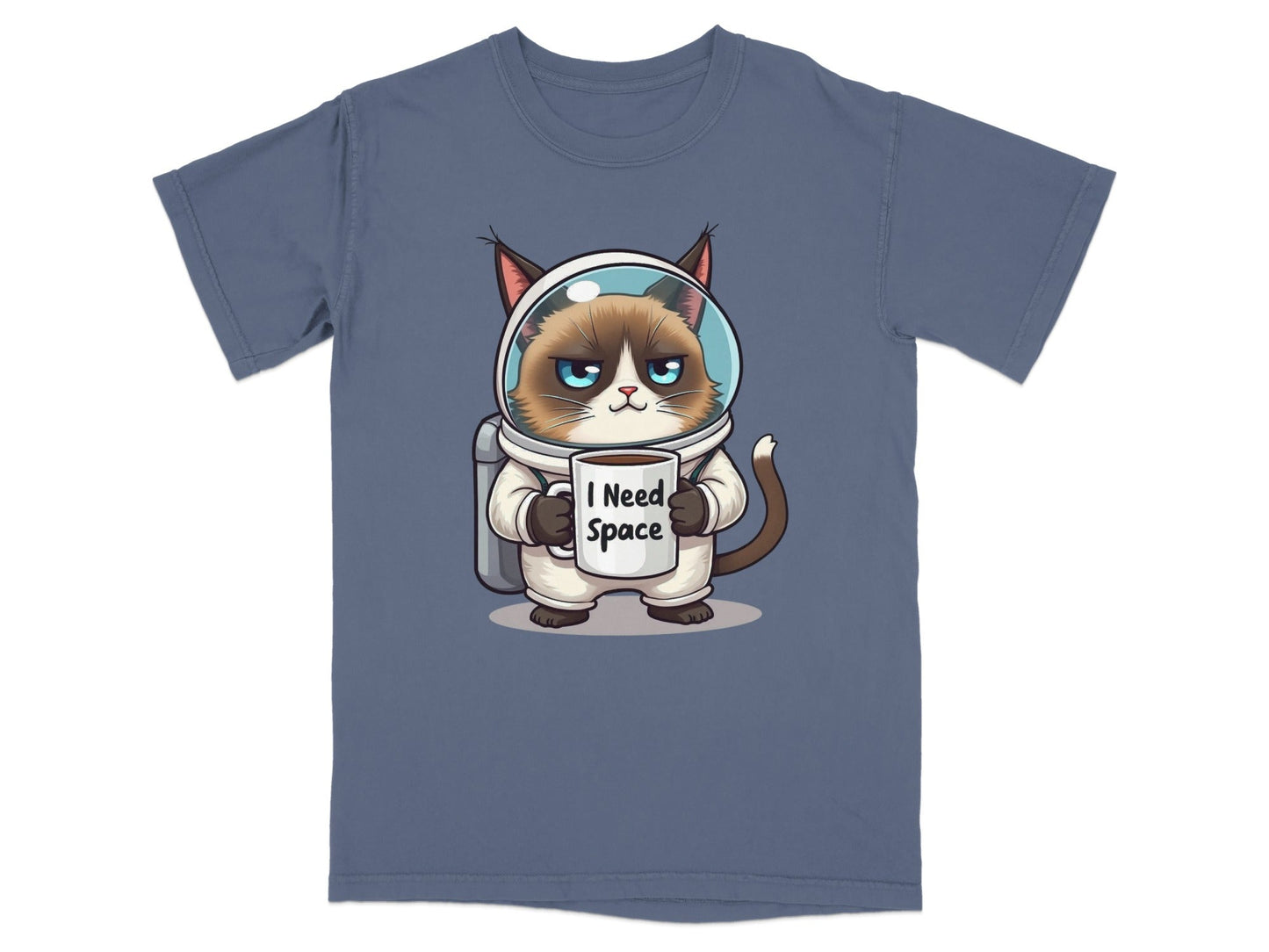 Funny t-shirt featuring a grumpy astronaut cat holding a mug that says 'I Need Space'.