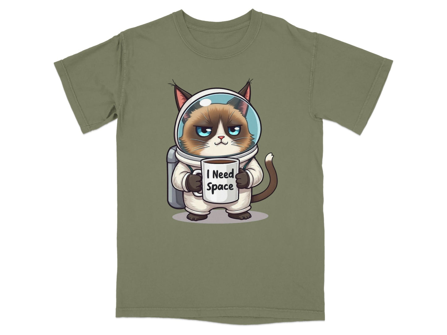 Funny astronaut cat t-shirt featuring a grumpy cat with 'I Need Space' mug in a spacesuit.