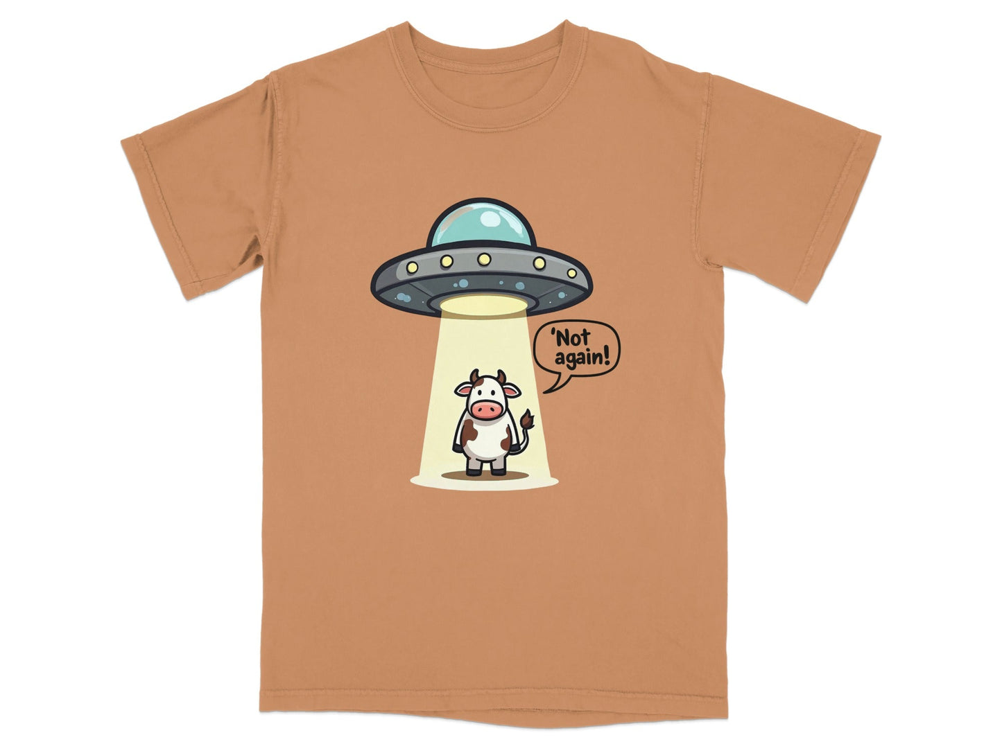 Funny T-Shirt featuring a cow saying 'Not again!' under a UFO, ideal for humor and alien enthusiasts.
