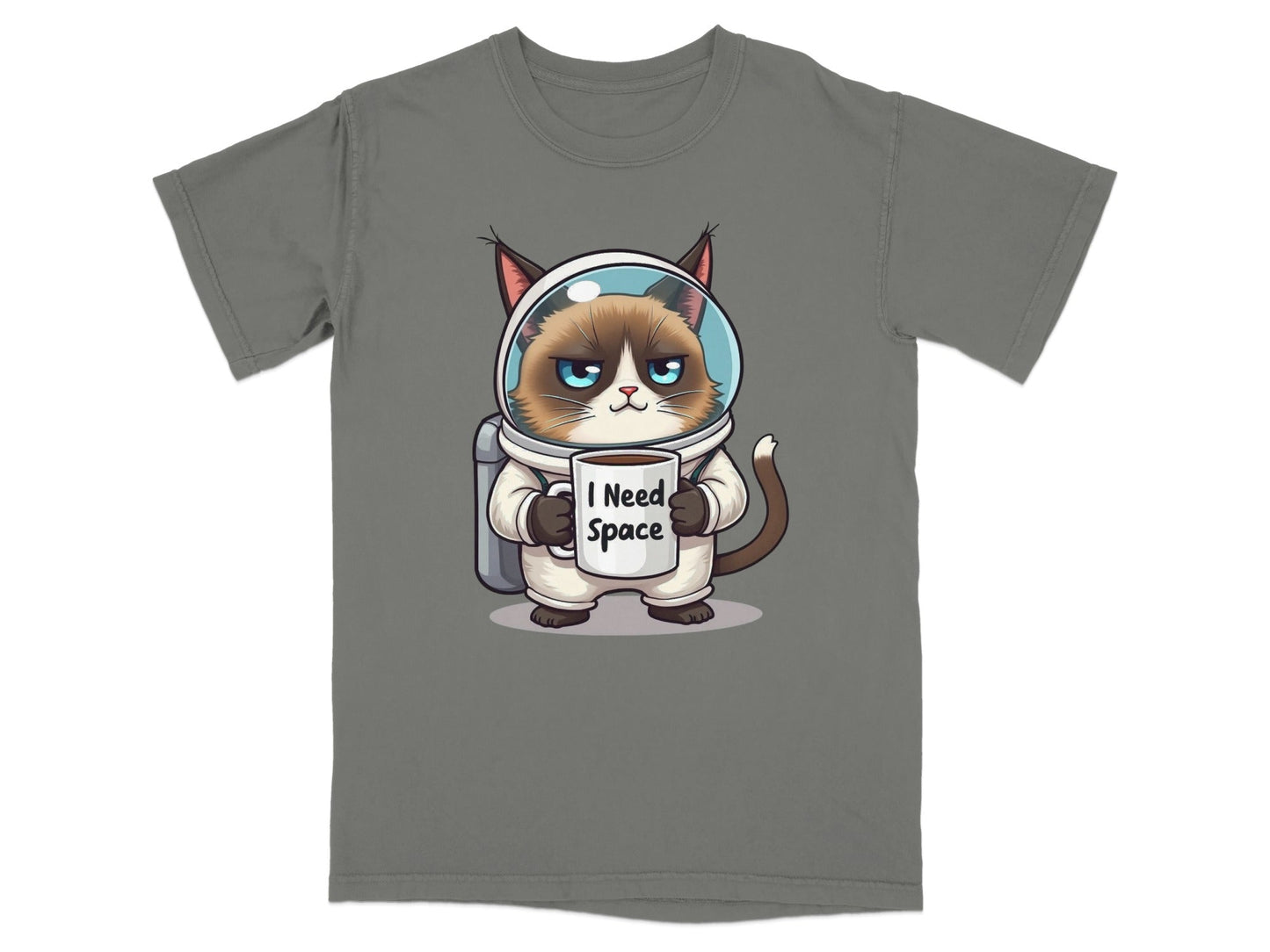 Funny astronaut cat t-shirt featuring a grumpy cat in spacesuit holding a mug that says 'I Need Space'.