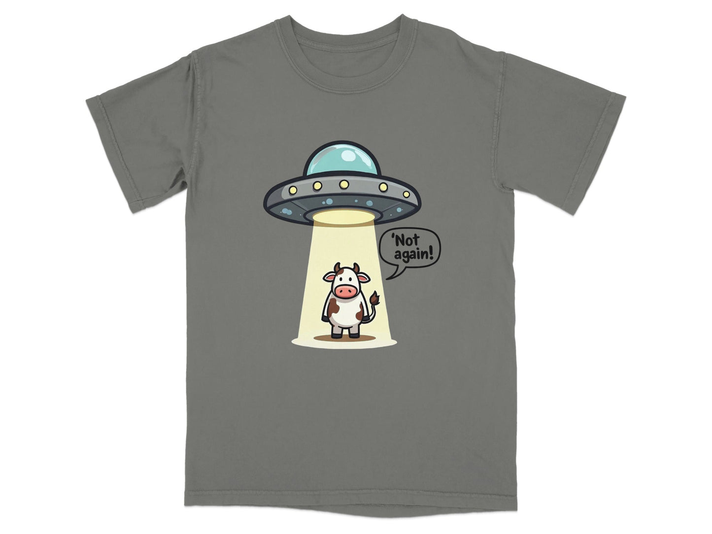 Funny T-shirt featuring a cow saying 'Not again!' under a UFO, perfect for humor and alien enthusiasts.
