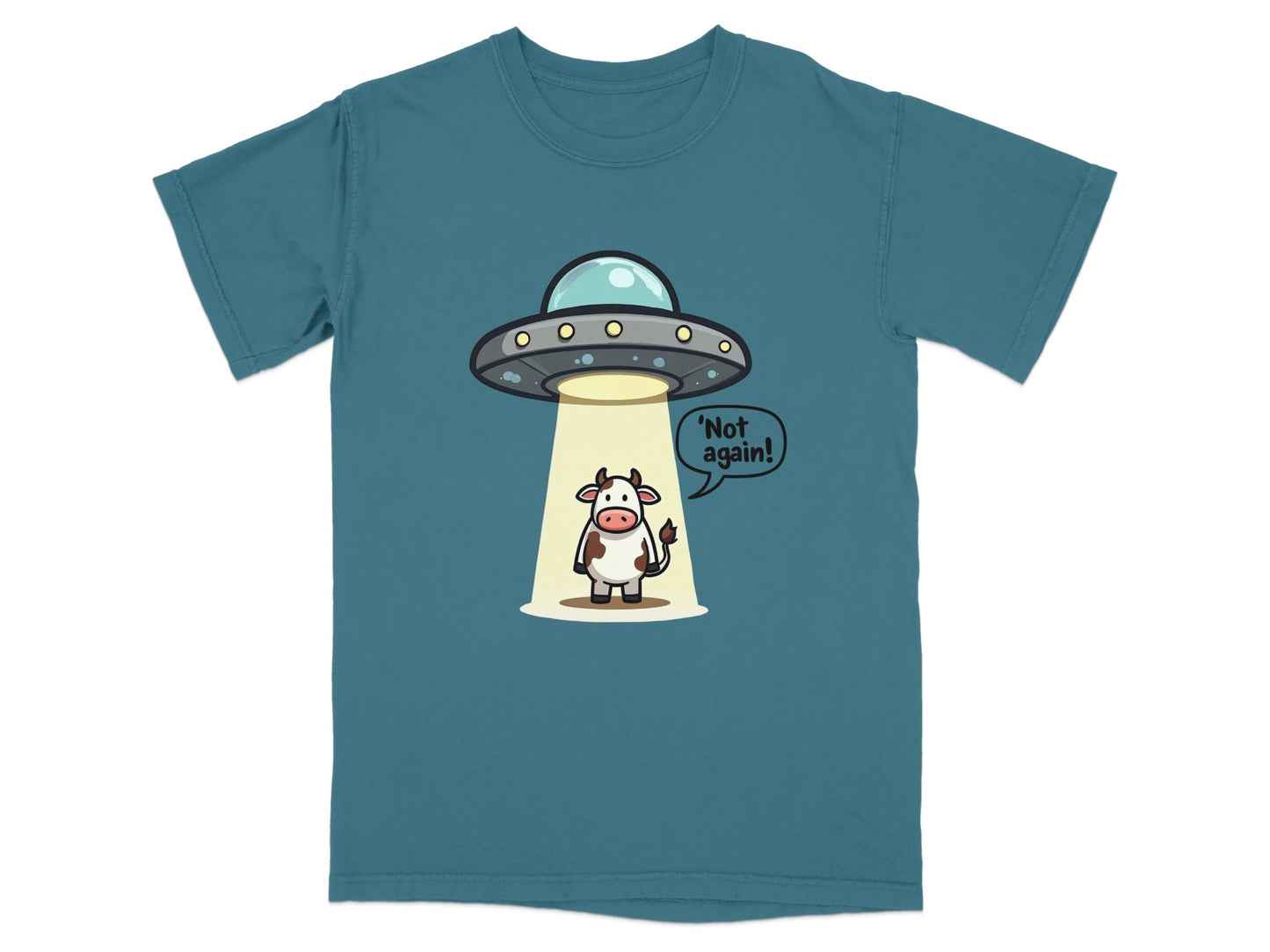 Funny alien abduction t-shirt featuring a cow saying 'Not again!' on a teal background.