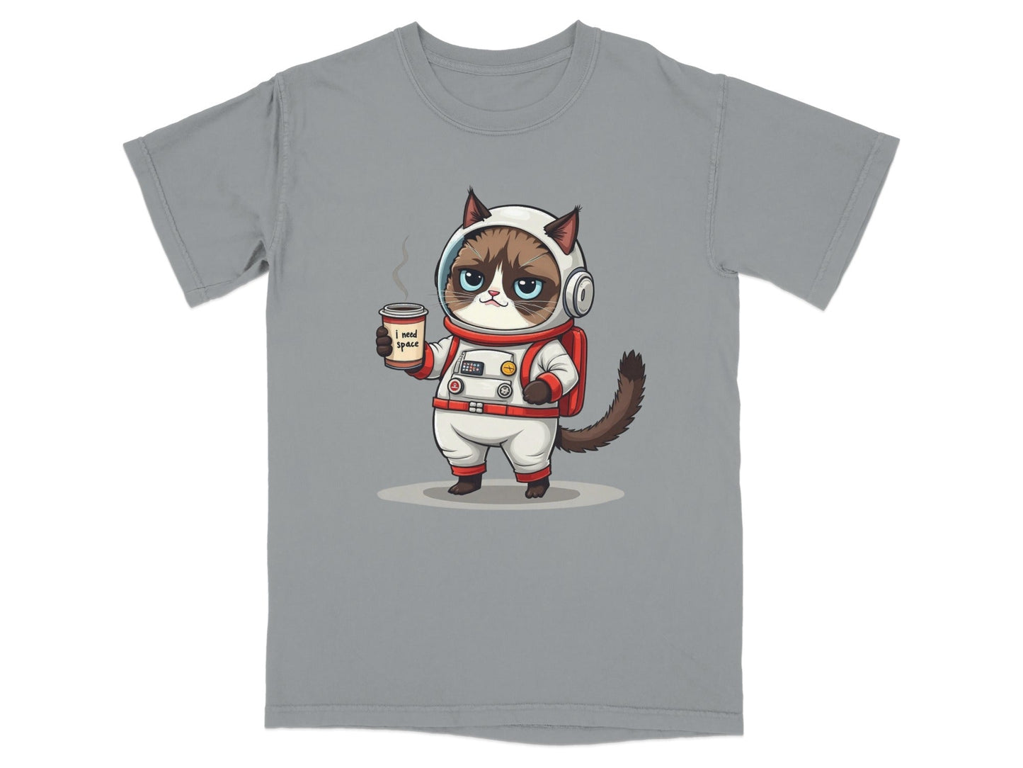 Grumpy astronaut cat graphic tee with coffee cup and 'I need space' text, relaxed fit humorous design.
