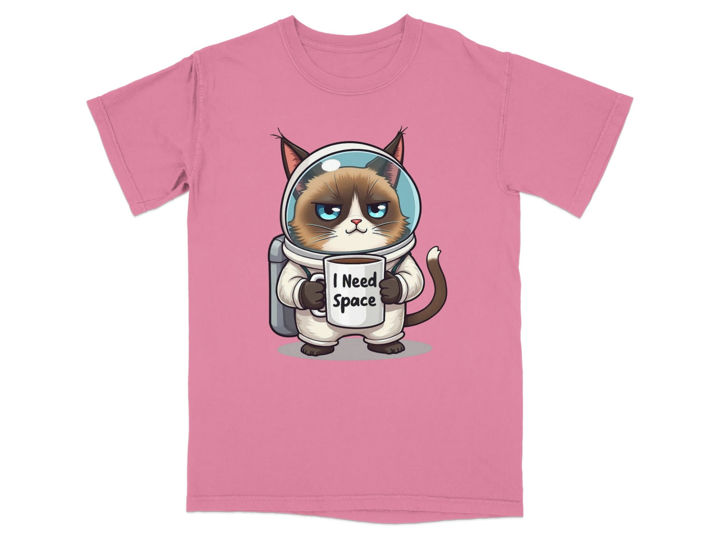 Funny astronaut cat t-shirt in pink with grumpy cat holding 'I Need Space' mug, perfect for cat lovers.