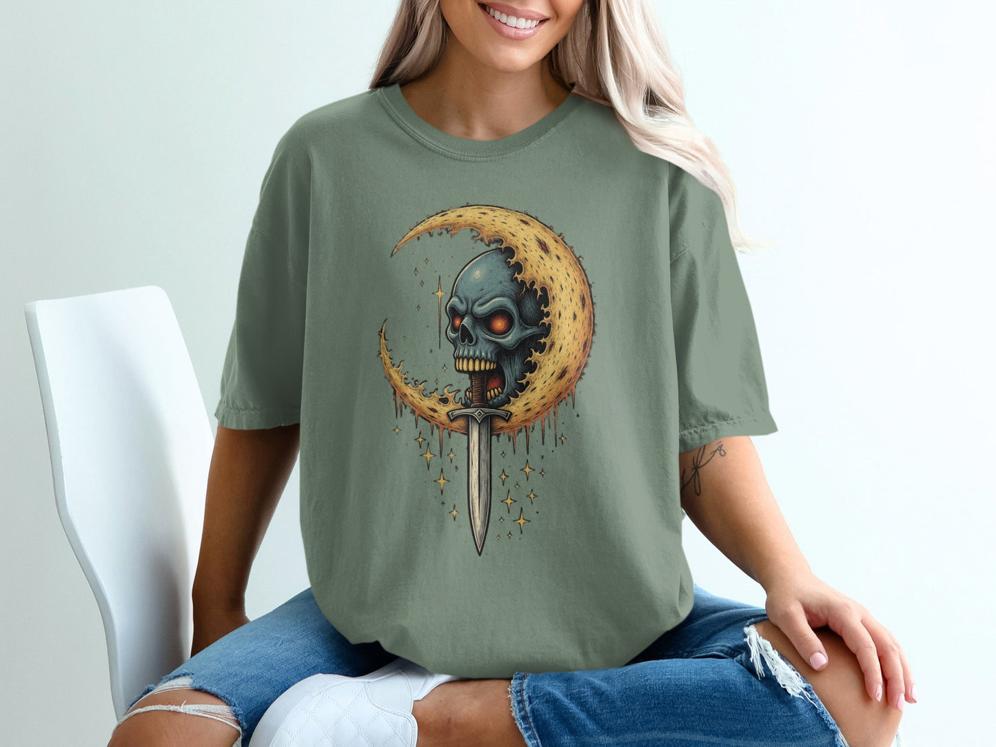 Skull with Sword and Crescent Moon Graphic T-shirt product type