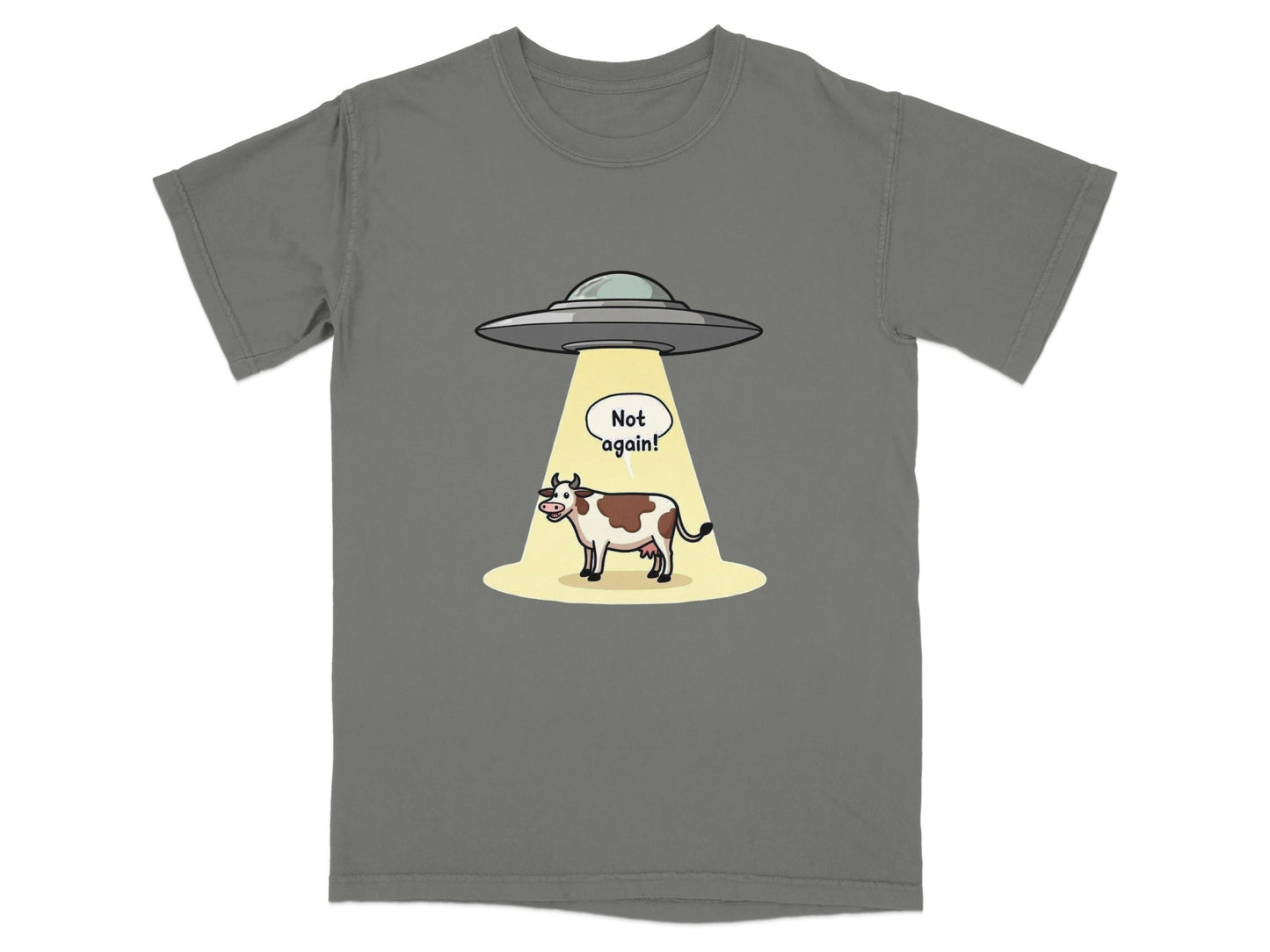 Funny t-shirt design featuring a cow being abducted by aliens with the text 'Not again!'