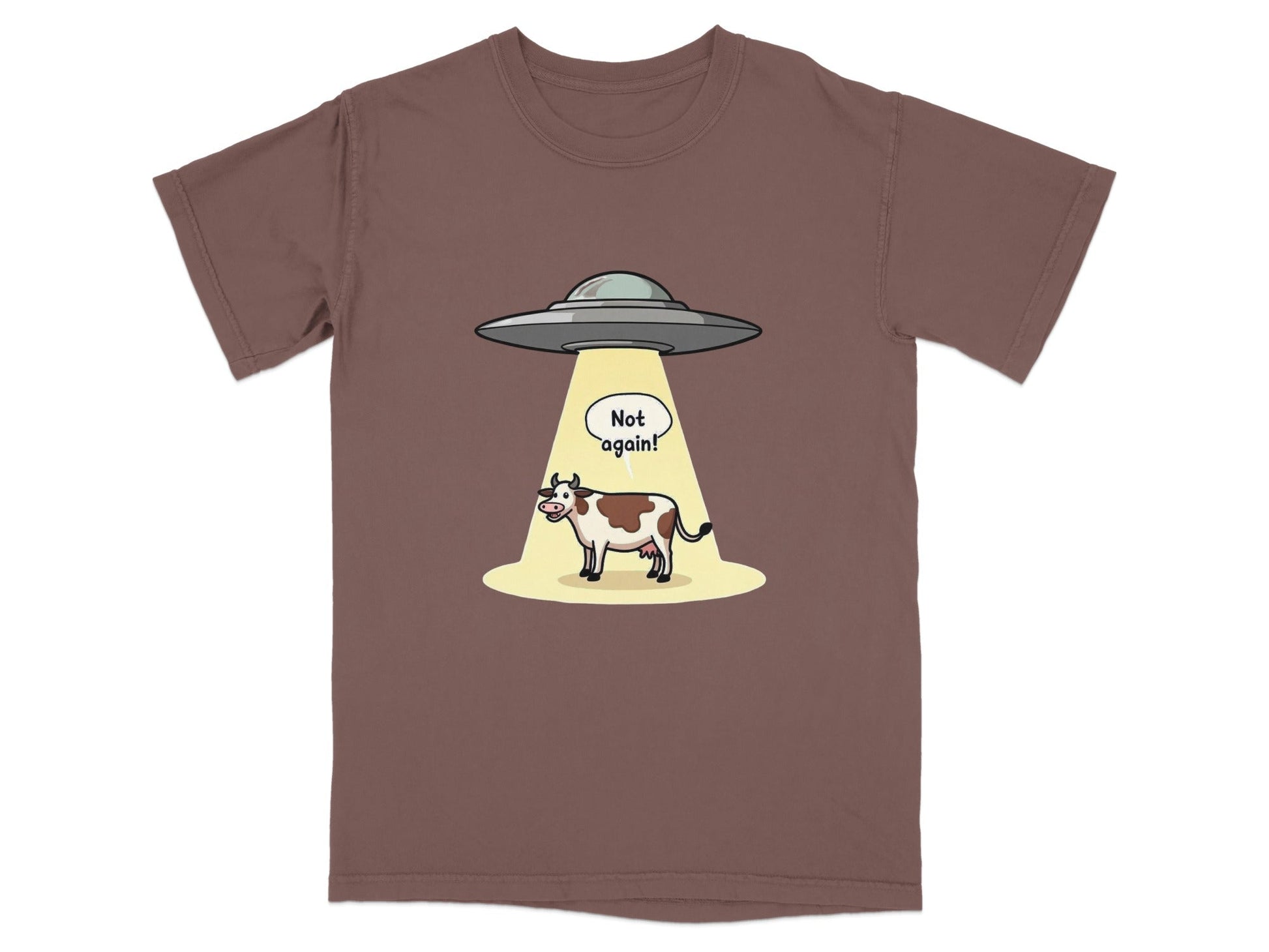 Humorous cow abduction cartoon t-shirt featuring alien spaceship and 'Not again!' speech bubble.