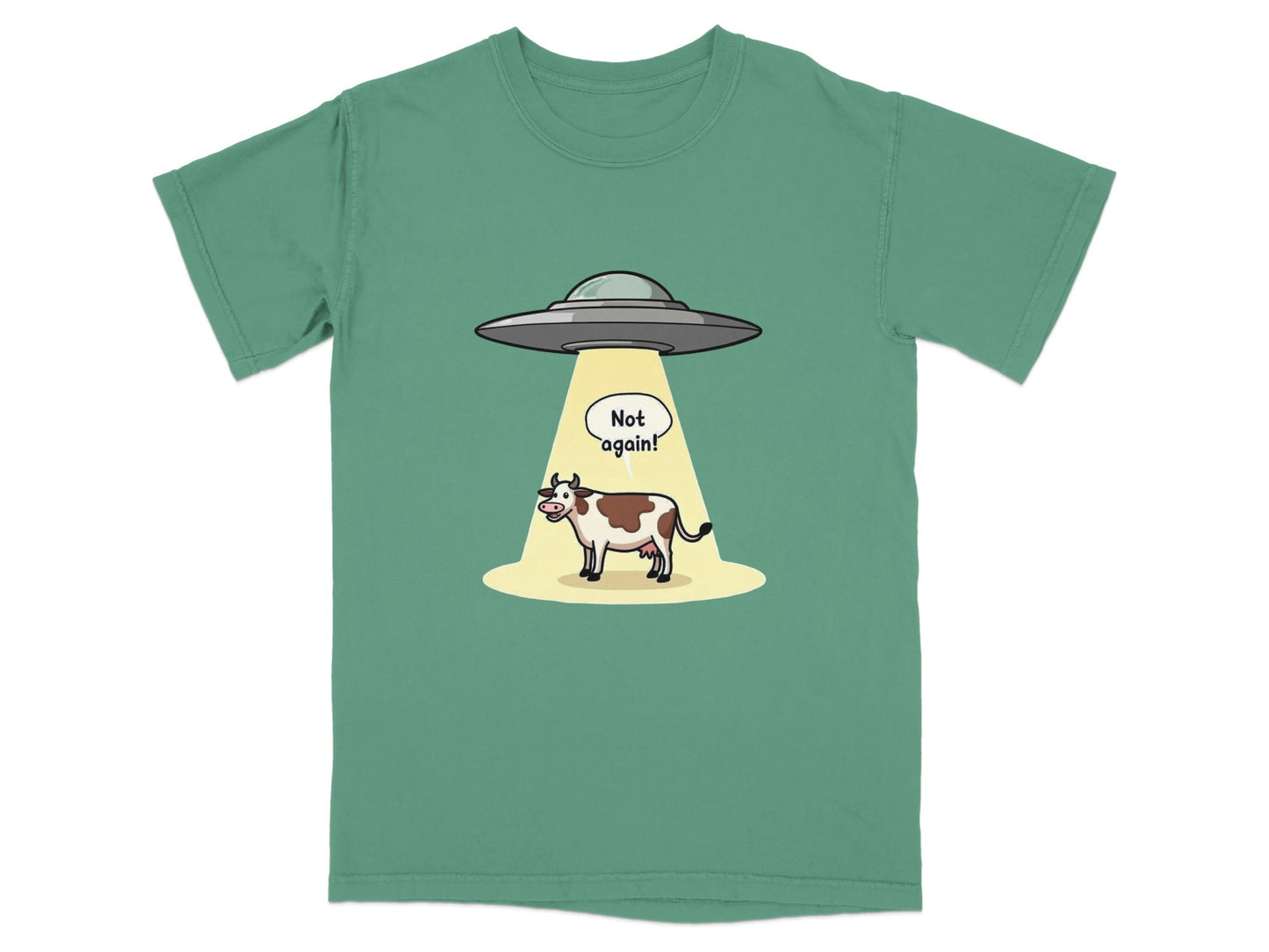 Cartoon t-shirt design featuring a cow being abducted by aliens with 'Not again!' speech bubble