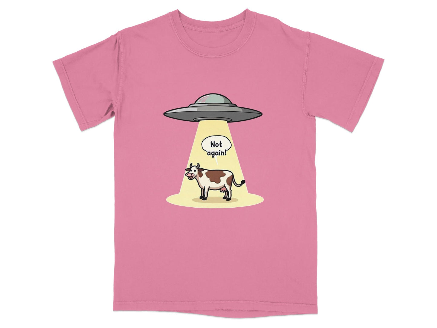 Funny t-shirt design featuring a cow being abducted by aliens with 'Not Again!' speech bubble.