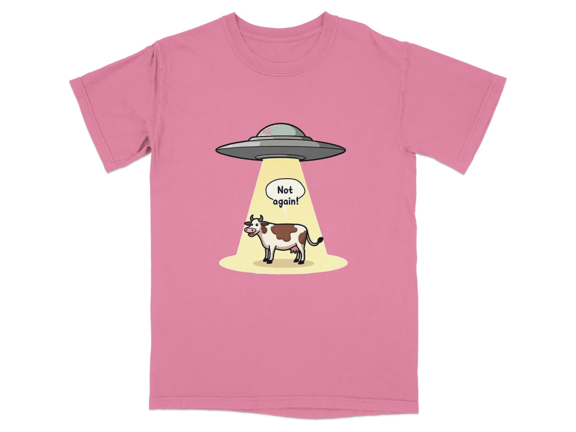 Funny t-shirt design featuring a cow being abducted by aliens with 'Not Again!' speech bubble.