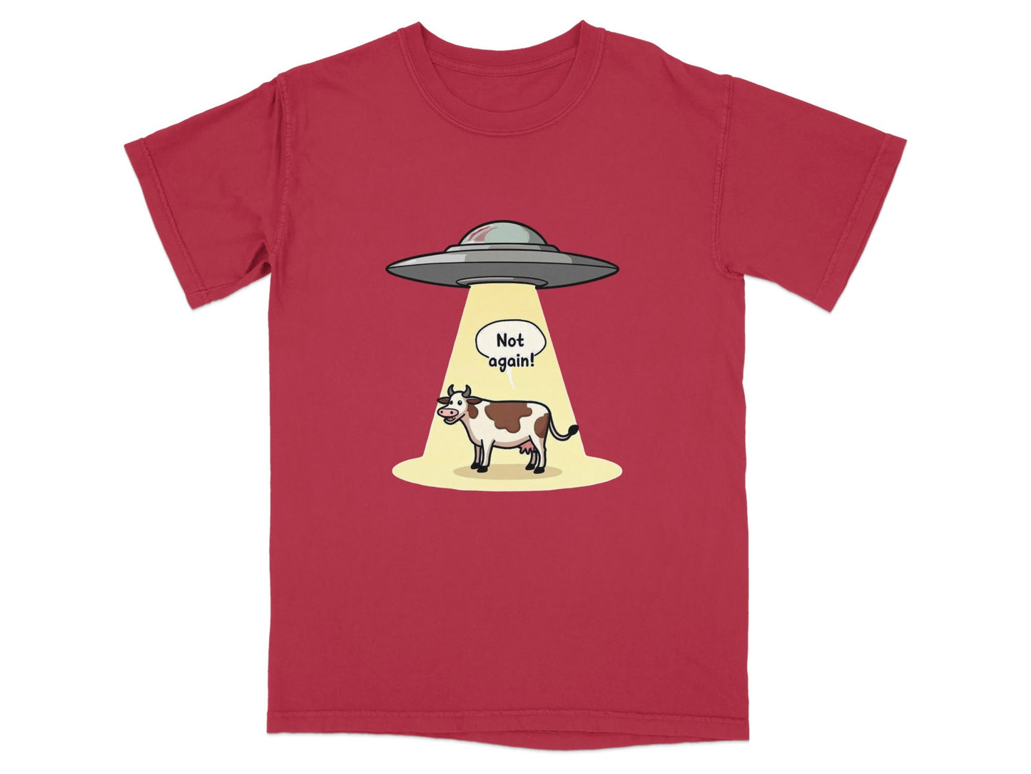 Funny cartoon T-shirt design of a cow being abducted by aliens with "Not again!" speech bubble.