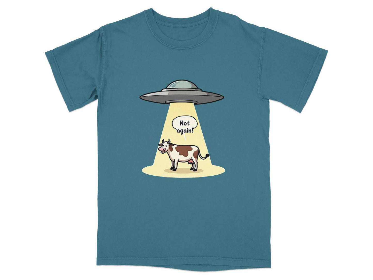 Funny t-shirt design with a cow abducted by aliens and a 'Not again!' speech bubble.