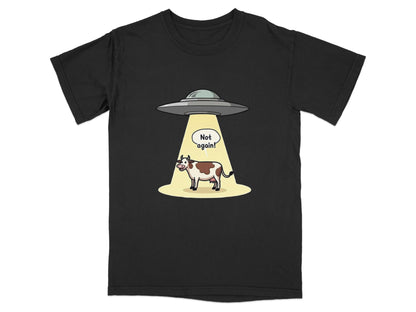 Funny alien abduction t-shirt featuring a cow with a speech bubble saying 'Not Again!'