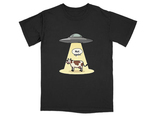 Funny alien abduction t-shirt featuring a cow with a speech bubble saying 'Not Again!'