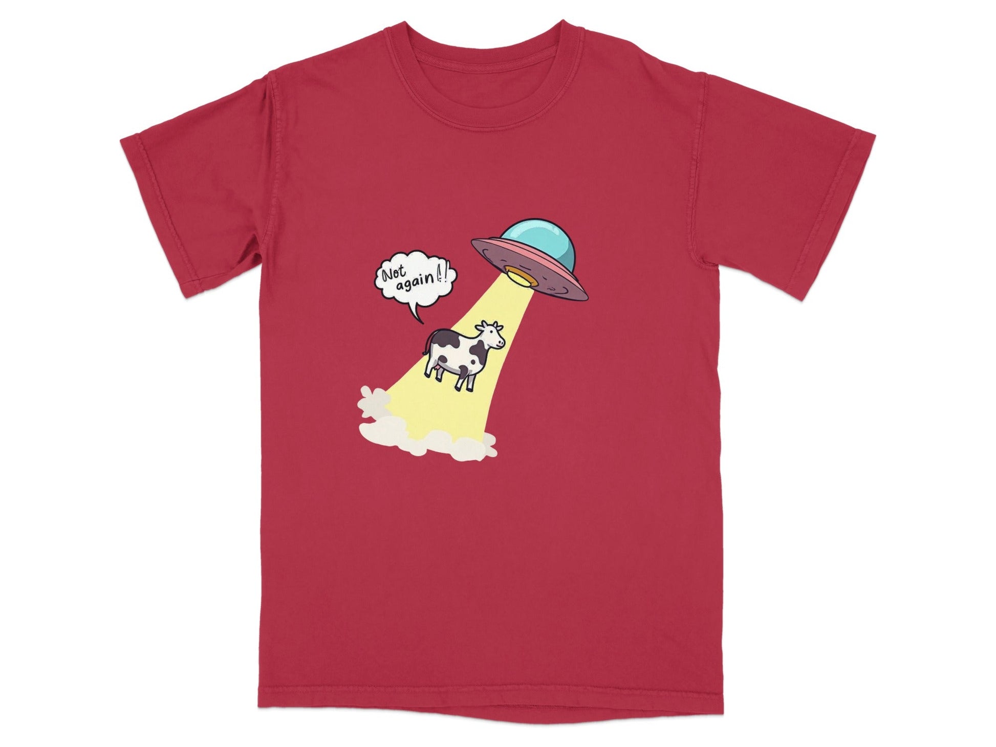 Funny alien abduction graphic t-shirt featuring a cow being beamed up by a UFO with the phrase 'Not again!'. Unisex fit.