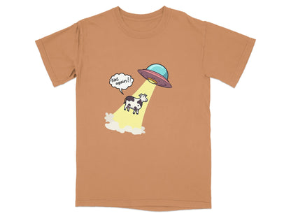 Funny alien abduction t-shirt featuring cow being beamed up by UFO with 'Not Again!' text.