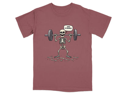 Funny Wink In Progress Skeleton Lifting Weights T-Shirt - IconVexa