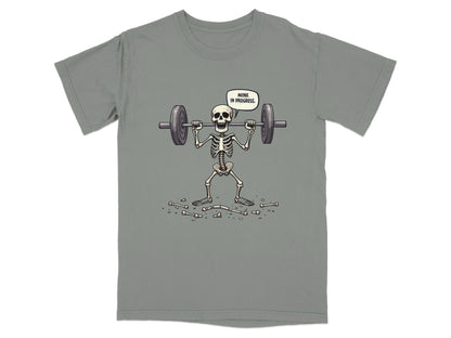 Funny Wink In Progress Skeleton Lifting Weights T-Shirt - IconVexa