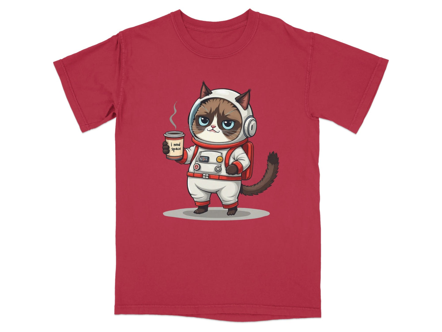 Cute grumpy cat in astronaut suit holding coffee on red t-shirt, perfect for cat lovers and space enthusiasts.