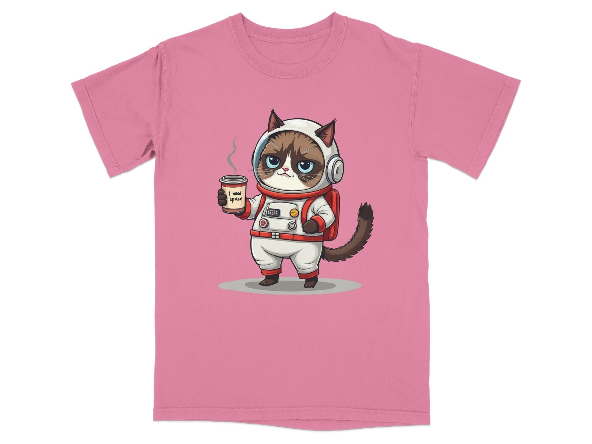 Cute grumpy astronaut cat in a spacesuit holding coffee on a pink t-shirt, with 'I need space' design.