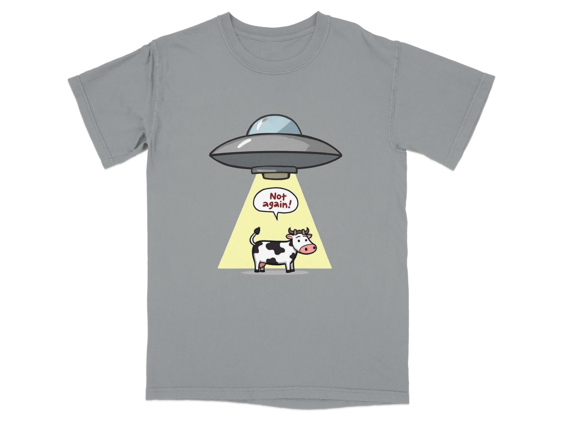Funny cartoon cow abduction graphic on a gray novelty T-shirt, perfect for sci-fi and UFO fans.