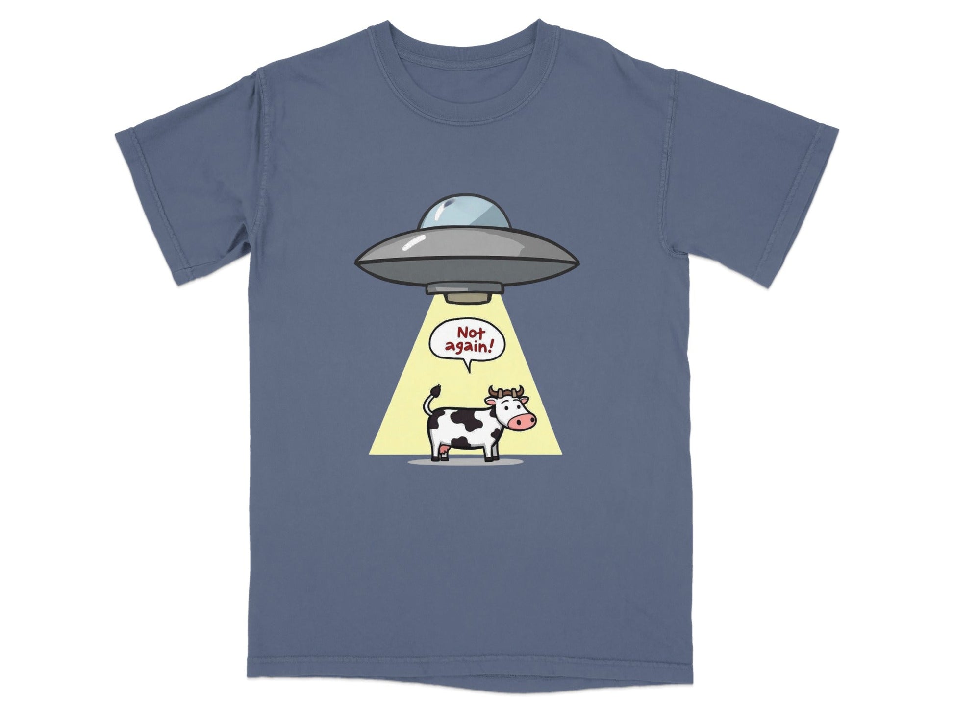 Funny cartoon t-shirt featuring a cow being abducted by a UFO with text saying 'Not again!' Perfect for sci-fi fans.