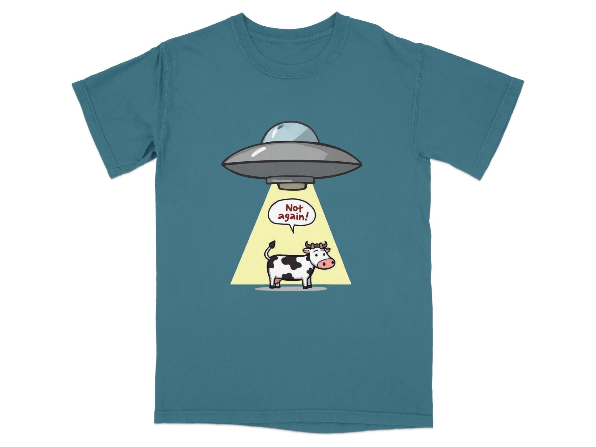 Funny cartoon cow abduction graphic on a teal T-shirt, perfect for sci-fi and UFO fans.