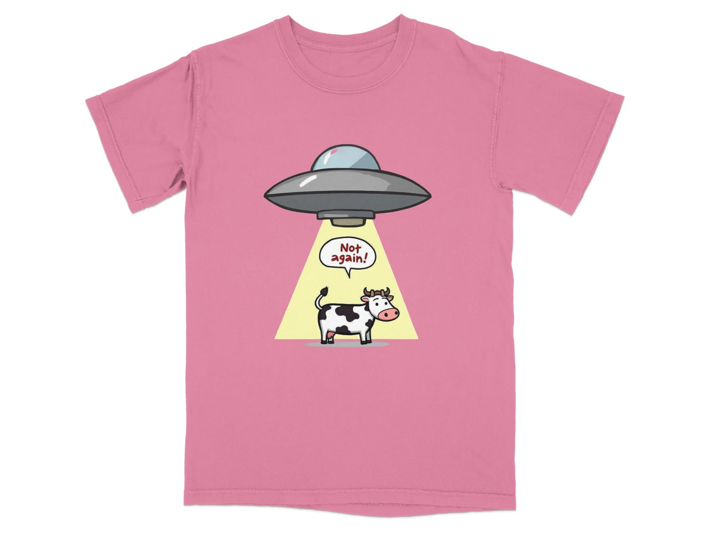 Funny cartoon cow abduction graphic on pink novelty T-shirt, perfect for sci-fi and UFO fans.